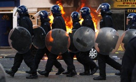 Riot police during the height of London&amp;#039;s upheaval: Britain&amp;#039;s poor economy and unemployment rates are similar to ours, which leads some to worry that an uprising is nye.