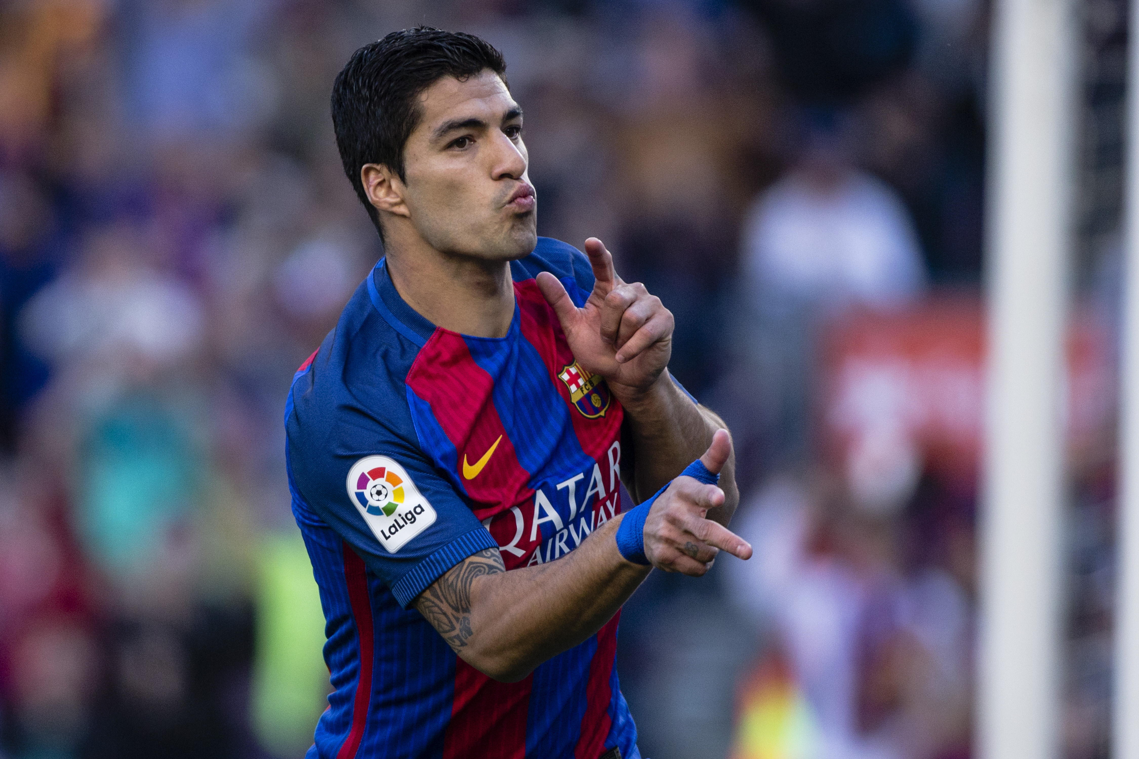 Luis Suarez celebrates after scoring for Barcelona against Villarreal in May 2017.