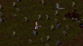 Top-down screenshot from Dark Ages, showing a cleric in a bright robe standing alone in a dark graveyard full of tombstones.