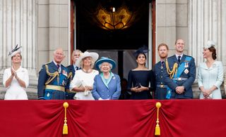 Sophie, Countess of Wessex, Prince Charles, Prince of Wales, Prince Andrew, Duke of York, Camilla, Duchess of Cornwall, Queen Elizabeth II, Meghan, Duchess of Sussex, Prince Harry, Duke of Sussex, Prince William, Duke of Cambridge and Catherine, Duchess of Cambridge watch a flypast to mark the centenary of the Royal Air Force from the balcony of Buckingham Palace on July 10, 2018 in London, England