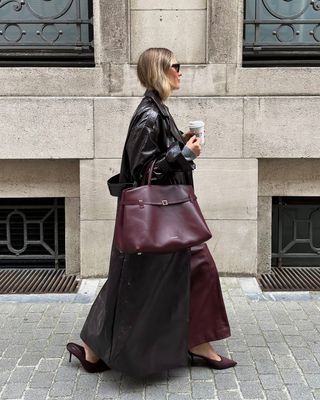 Tine Van Cauwenberghe with a burgundy bag