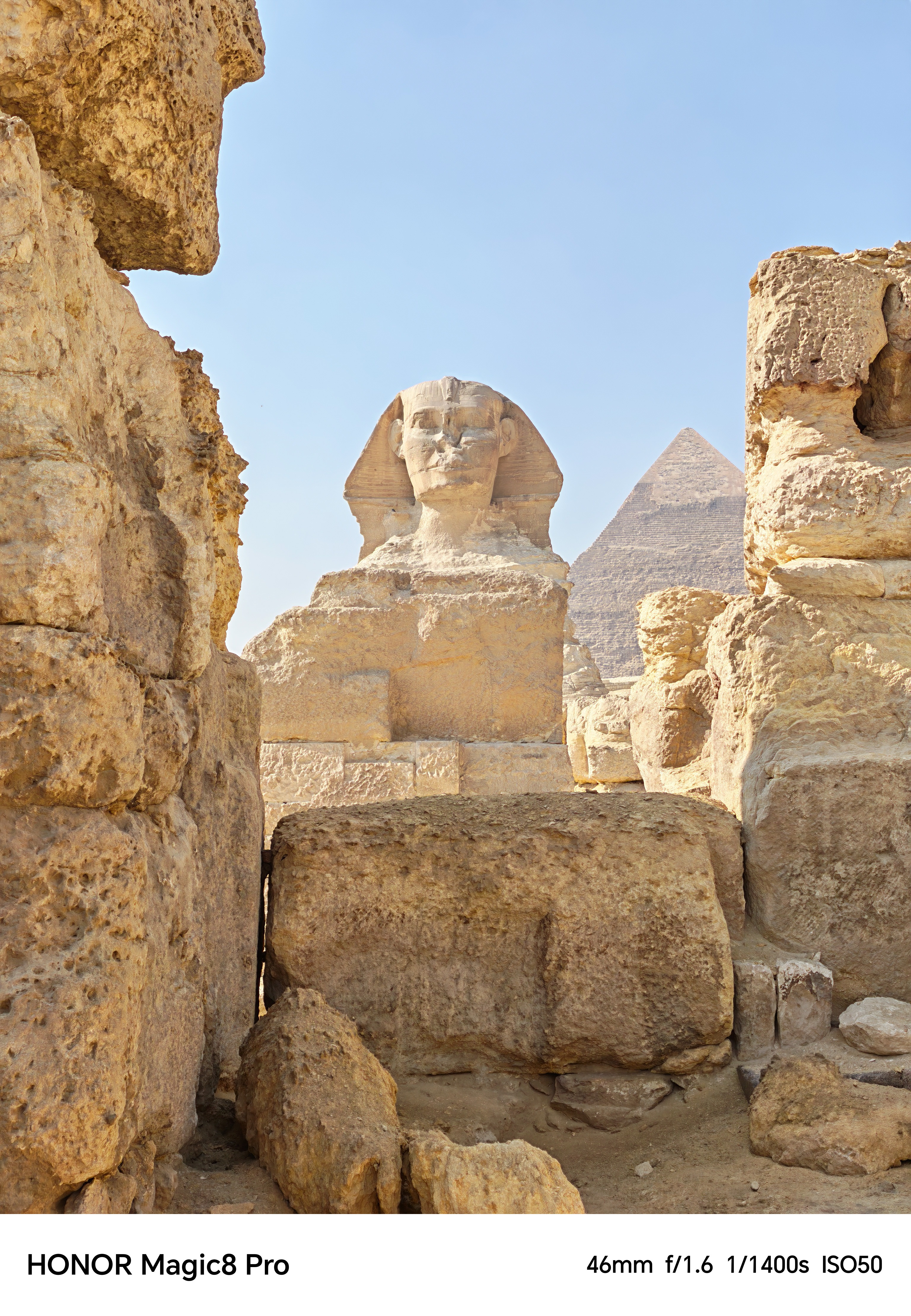 The sphinx in Egypt seen through a gap in some rocks shot on an Honor Magic 8 Pro