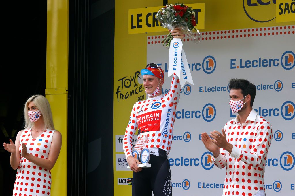 LE CREUSOT FRANCE JULY 02 Matej Mohori of Slovenia and Team Bahrain Victorious Polka Dot Mountain Jersey celebrates at podium during the 108th Tour de France 2021 Stage 7 a 2491km km stage from Vierzon to Le Creusot 369m Trophy LeTour TDF2021 on July 02 2021 in Le Creusot France Photo by Chris GraythenGetty Images