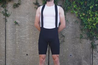 Male cyclist wearing the 7mesh MK3 Cargo Bib Shorts for gravel cycling