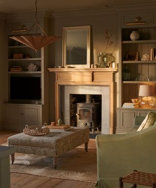 small living room storage ideas with alcove storage and a log burner