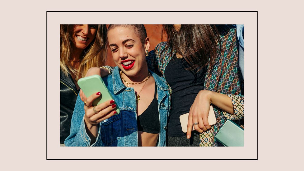 women on phones laughing on a beige background