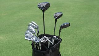 A set of PXG golf clubs