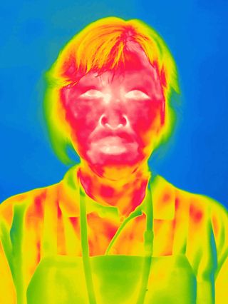 Heat map style photograph of woman.