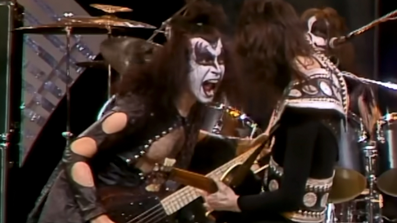 Gene Simmons with his mouth open, rocking out with Ace Frehley on The Midnight Special