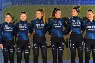 OETINGEN BELGIUM MARCH 09 Cassia Boglio of Australia Julia Borgstrm of Sweden Amelia Sharpe of United Kingdom Lone Meertens of Belgium Eline Van Rooijen of Netherlands Maureen Arens of Netherlands and Nxtg By Experza Team during the team presentation prior to the 2nd GP Oetingen 2022 Womens Elite a 130km one day race from Oetingen to Oetingen gpoetingen on March 09 2022 in Oetingen Belgium Photo by Luc ClaessenGetty Images