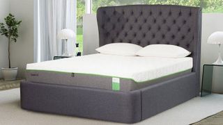 The Tempur Hybrid mattress on a bed