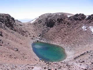 Licancabur Lake lies at the top of the Andes Mountains, where the low oxygen, thin altitude and high ultraviolet radiation create conditions similar to those found on ancient Mars.