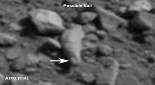 "Possible ancient finger" spotted in Curiosity photos.