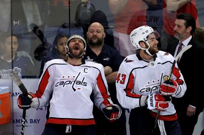  Alex Ovechkin #8 and Tom Wilson #43 of the Washington Capitals celebrate after defeating the Tampa Bay Lightning in Game 7 of the Eastern Conference Finals.