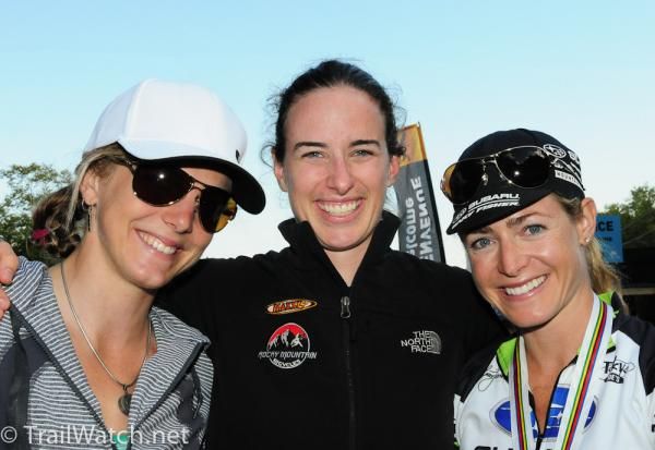 A trio of Americans watches the action (left to right): Heather Irmiger, Lea Davison, Willow Koerber (bronze medalist in the women's race)