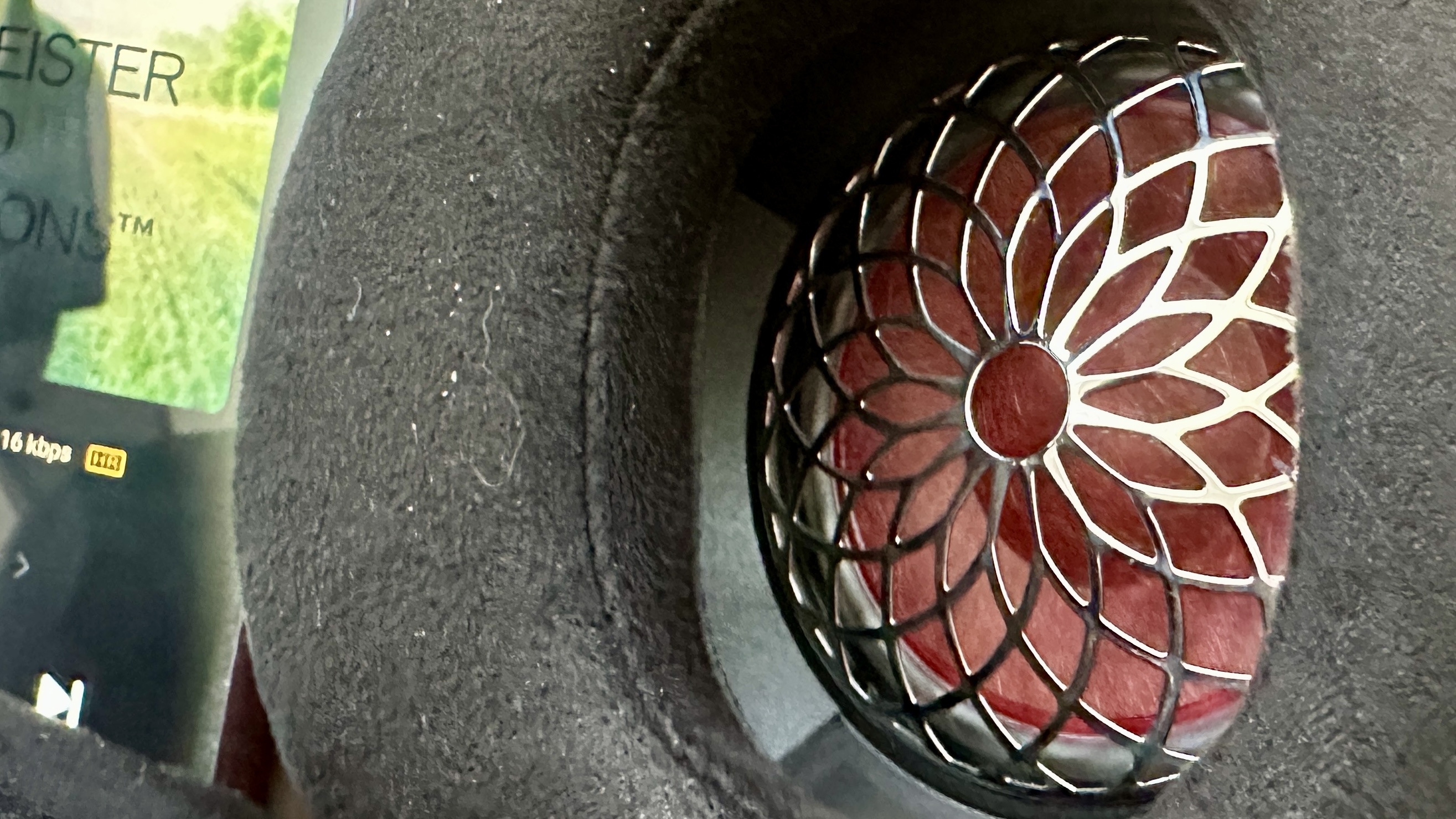 Closeup of the drivers in earcup of the FiiO FT13 closed-back over-ear wired headphones.