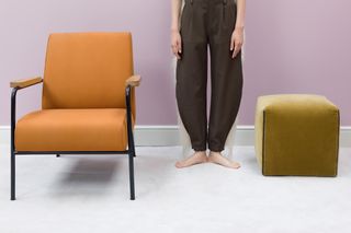 Chloé trousers, Jean Prouvé armchair and Nicola Gallizia pouf