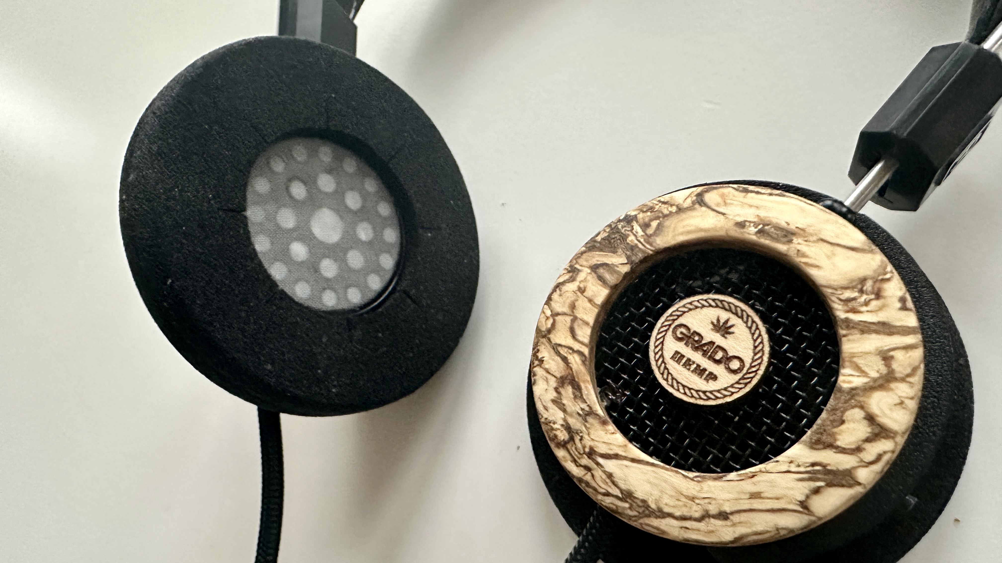 Grado Hemp headphones with one cup rotated to the front and one to the back, to showcase their open-backed nature