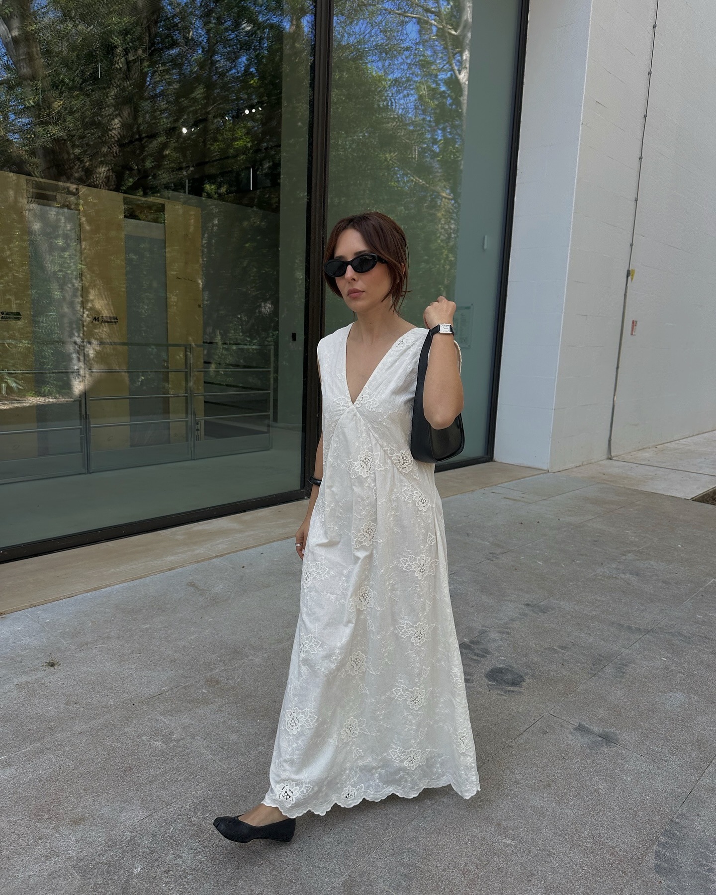 Influencer wearing white nightgown dress.