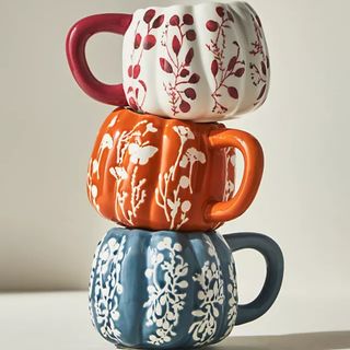 Three Floral Pumpkin Mugs stacked on top of each other 