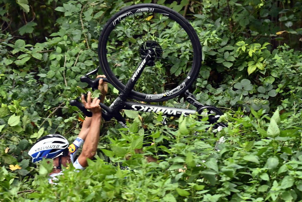 Belgian Mauri Vansevenant of Deceuninck QuickStep crashes during the 84th edition of the mens race of La Fleche Wallonne a one day cycling race Waalse Pijl Walloon Arrow 220km from Ans to Huy Wednesday 30 September 2020 This years edition was postponed from April to September due to the ongoing Coronavirus crisis BELGA PHOTO ERIC LALMAND Photo by ERIC LALMANDBELGA MAGAFP via Getty Images