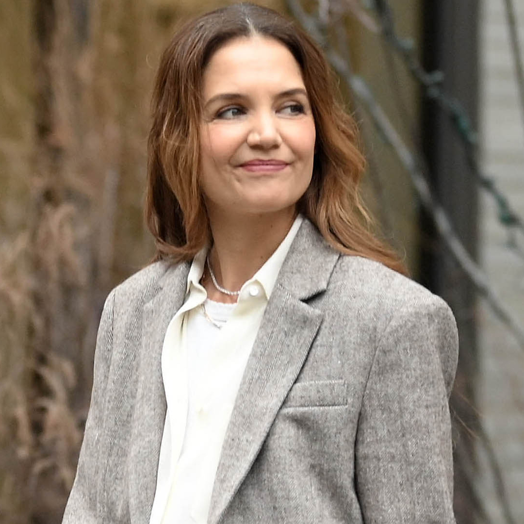 Katie Holmes layered a white T-shirt underneath an early fall flannel