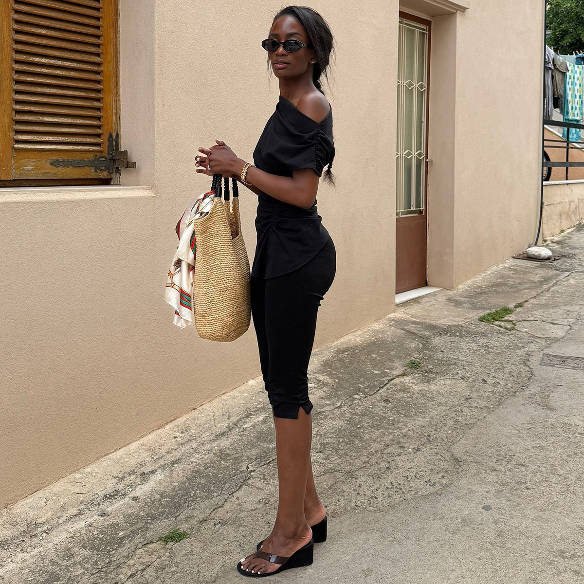 @_livmadeline wearing capris and wedge sandals