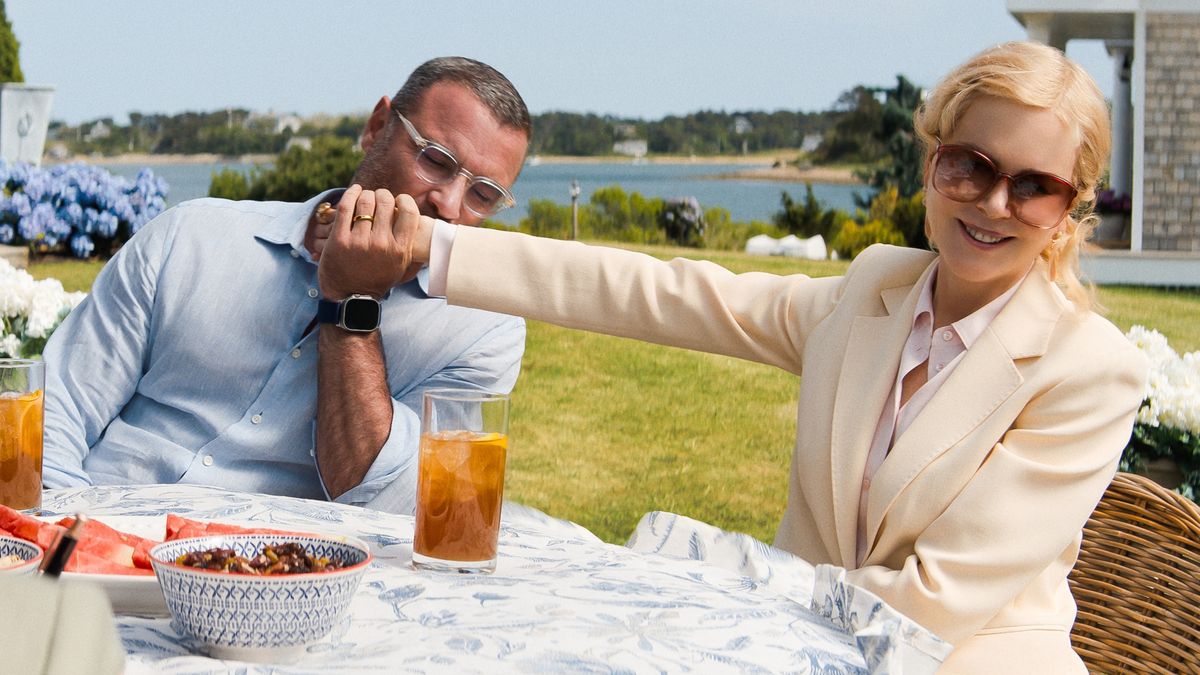 Tag (Liev Schreiber) and Greer (Nicole Kidman) Winbury sitting together at a table in &quot;The Perfect Couple!