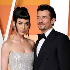 Katy Perry and Orlando Bloom attend the Vanity Fair Oscars Party in 2025