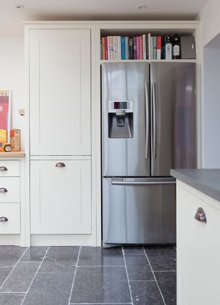 picture of a fridge freezer in a kitchen