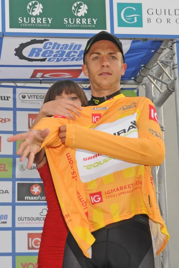 Jonathan Tiernan Locke pulls on the gold jersey