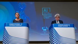 Margrethe Vestager and Thierry Breton speaking at a press conference on AI in 2021