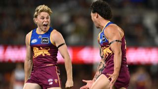 Cam Rayner of the Lions celebrates with Levi Ashcroft of the Lions after kicking a goal during the AFL Semi Final match between Brisbane Lions and Adelaide Crows