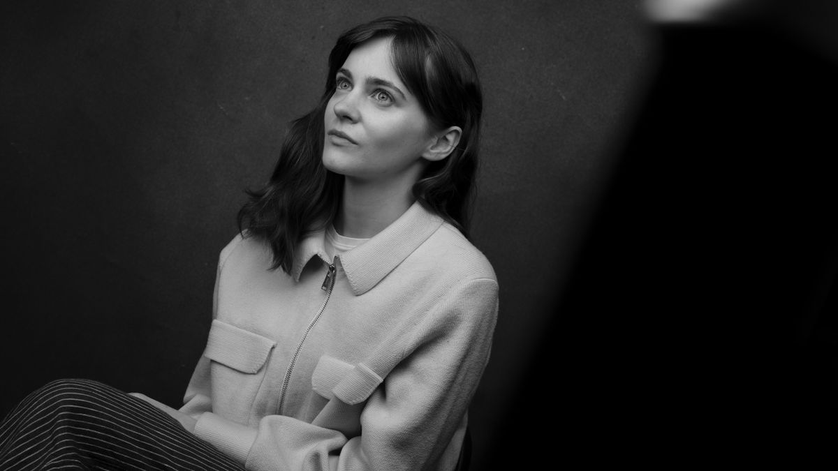 A black and white portrait of a woman taken by portrait photographer Kalum Carter