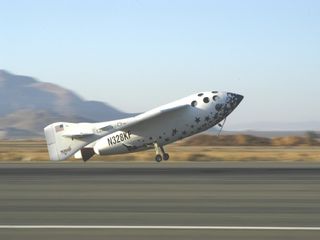 SpaceShipOne returns to the runway following a suborbital flight.