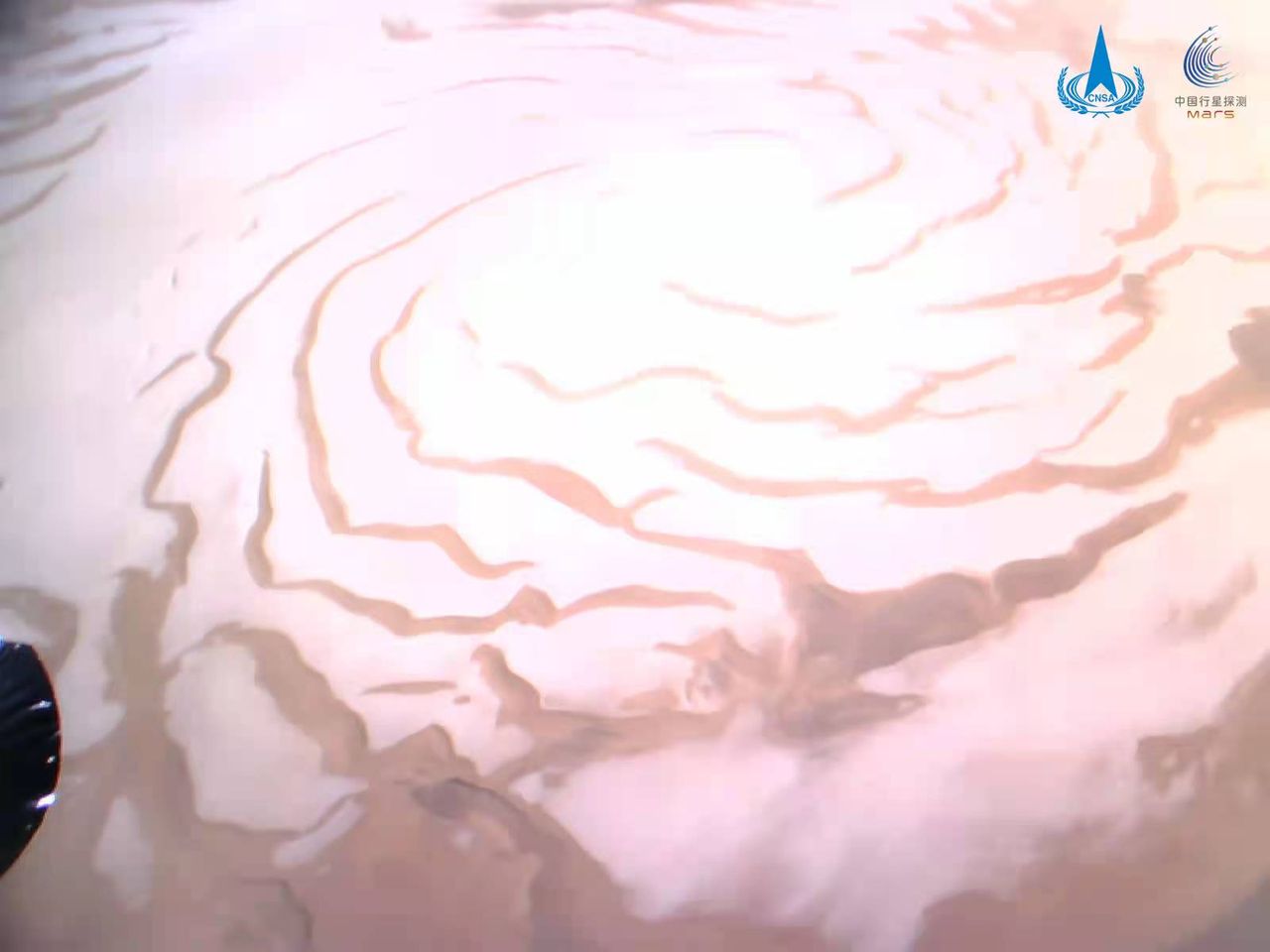 The northern ice cap of Mars as seen by China's Tianwen-1 orbiter.