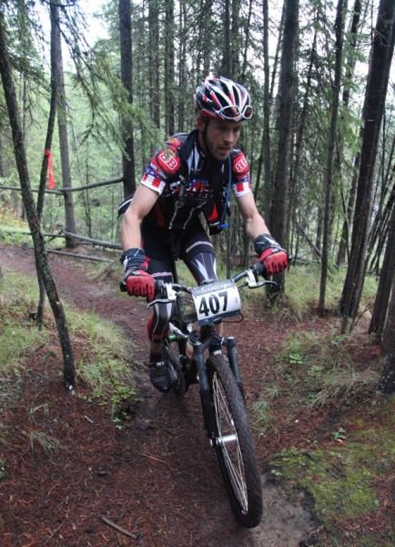 A team Warthog rider winds his way through a forest