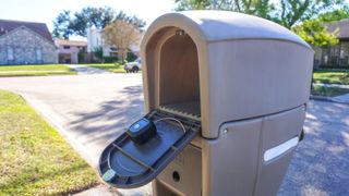 The Ring Mailbox Sensor's antenna installed on the back of a mailbox