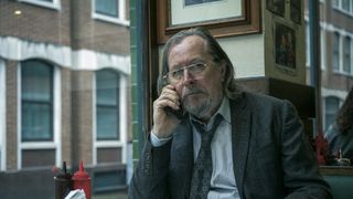Gary Oldman on the phone as Jackson Lamb in Slow Horses
