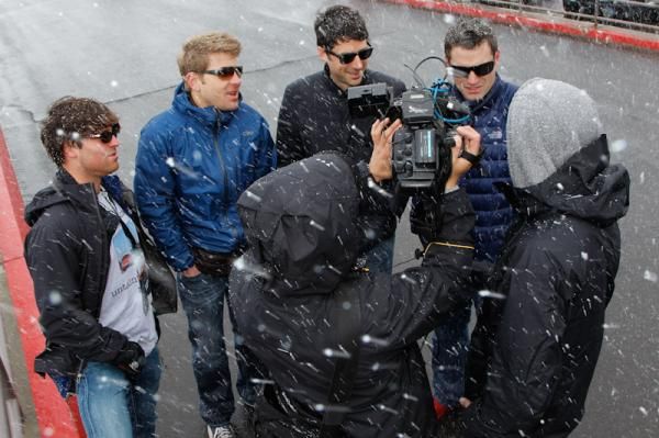 At the start, some fans from Seattle, Washington wonder for the TV cameras if they brought the precipitation with them.