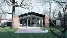 House under the Poplars, a bungalow in Murgle, Slovenia, by OFIS arhitekti