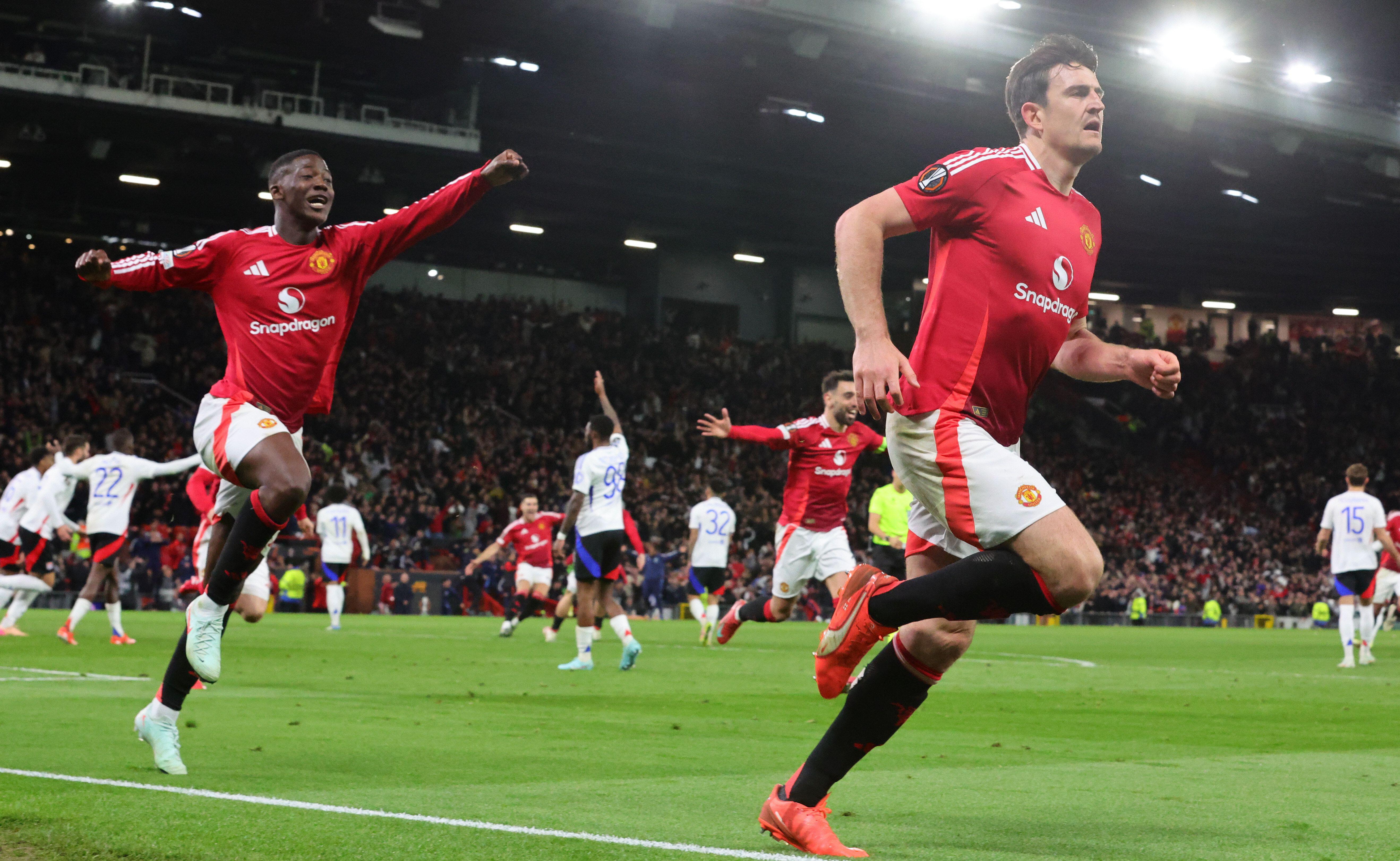 Harry Maguire celebrates after scoring Manchester United's winning goal against Lyon in the Europa League quarter-finals, April 2025.