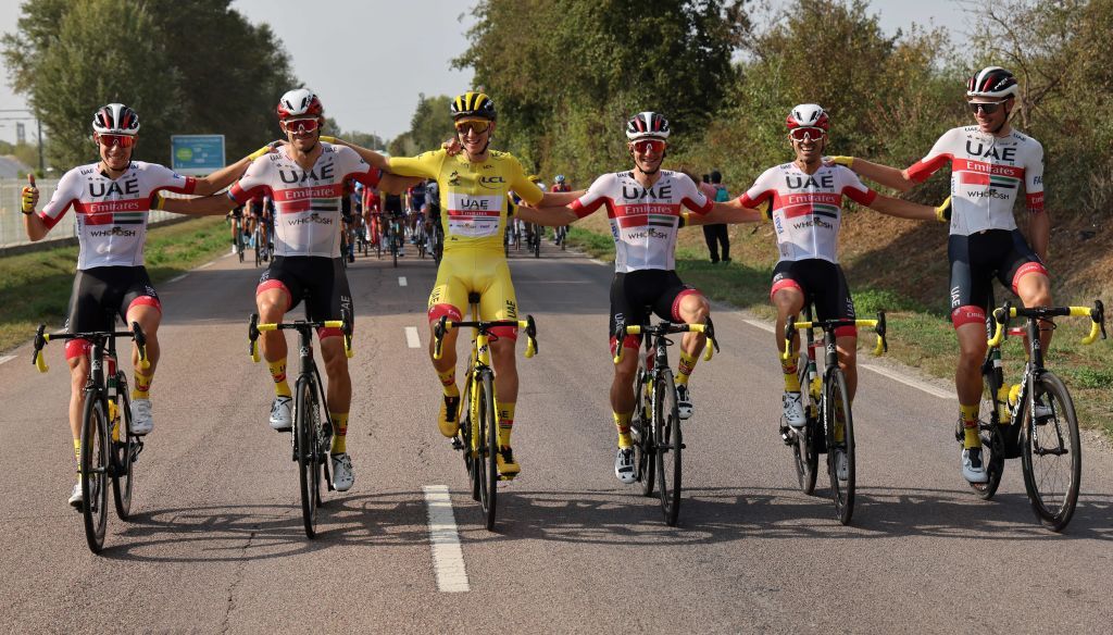 Team UAE Emirates rider Slovenias Tadej Pogacar wearing the overall leaders yellow jersey 3rdL and Team UAE Emirates riders ride during the 21st and last stage of the 107th edition of the Tour de France cycling race 122 km between ManteslaJolie and Champs Elysees Paris on September 20 2020 Photo by Kenzo Tribouillard AFP Photo by KENZO TRIBOUILLARDAFP via Getty Images