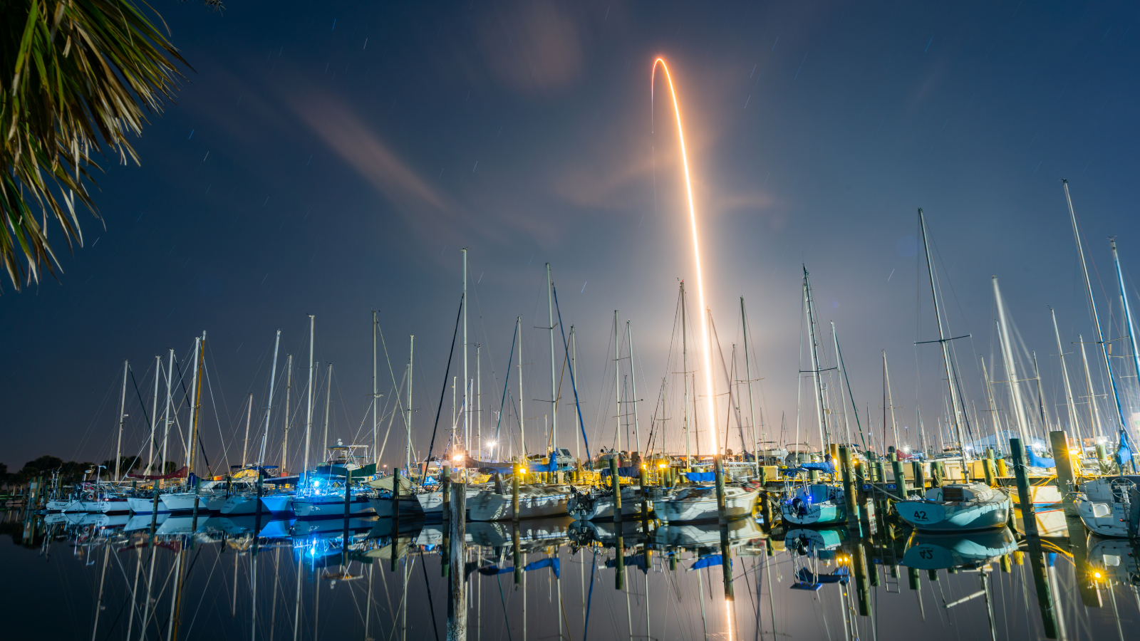 Timelapse photo of a rocket taking off at night