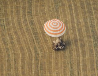 Expedition 30 Landing with Parachute Canopy Up