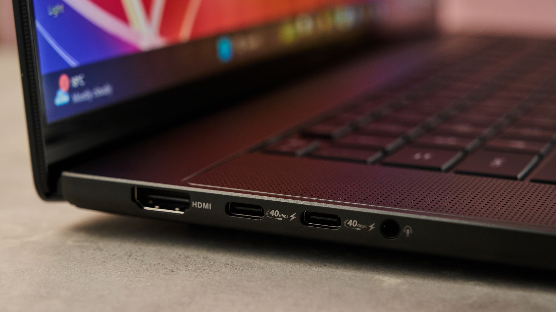 A closeup of the left side of the ProArt P16 RTX Spark showing its HDMI port, two USB-C ports and a microphone and headphone jack.