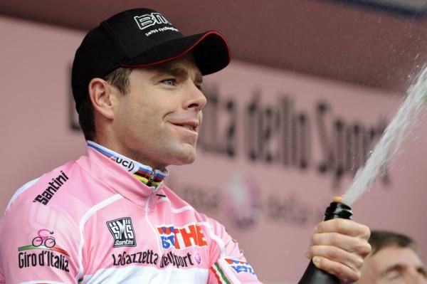 Cadel Evans (BMC Racing Team) makes light work of the champagne on the podium