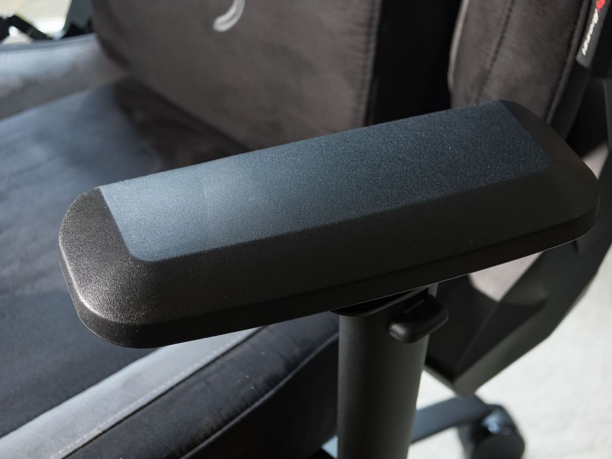 Closeup of the Arozzi Vernazza Supersoft gaming chair's arm rest, turned inwards