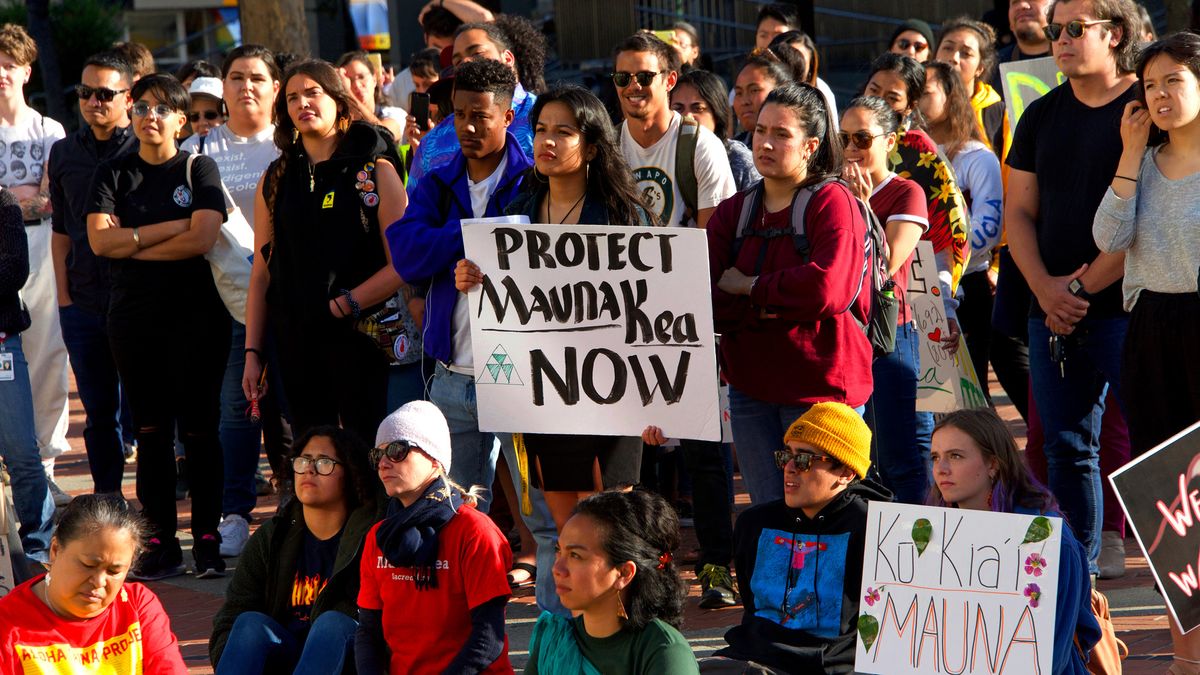 Unidentified activists gather at Sproul Plaza to protest in solidarity with the activists in Hawaii to protect Mauna Kea from the building of a thirty-meter telescope atop the volcano, which is considered a sacred site. 