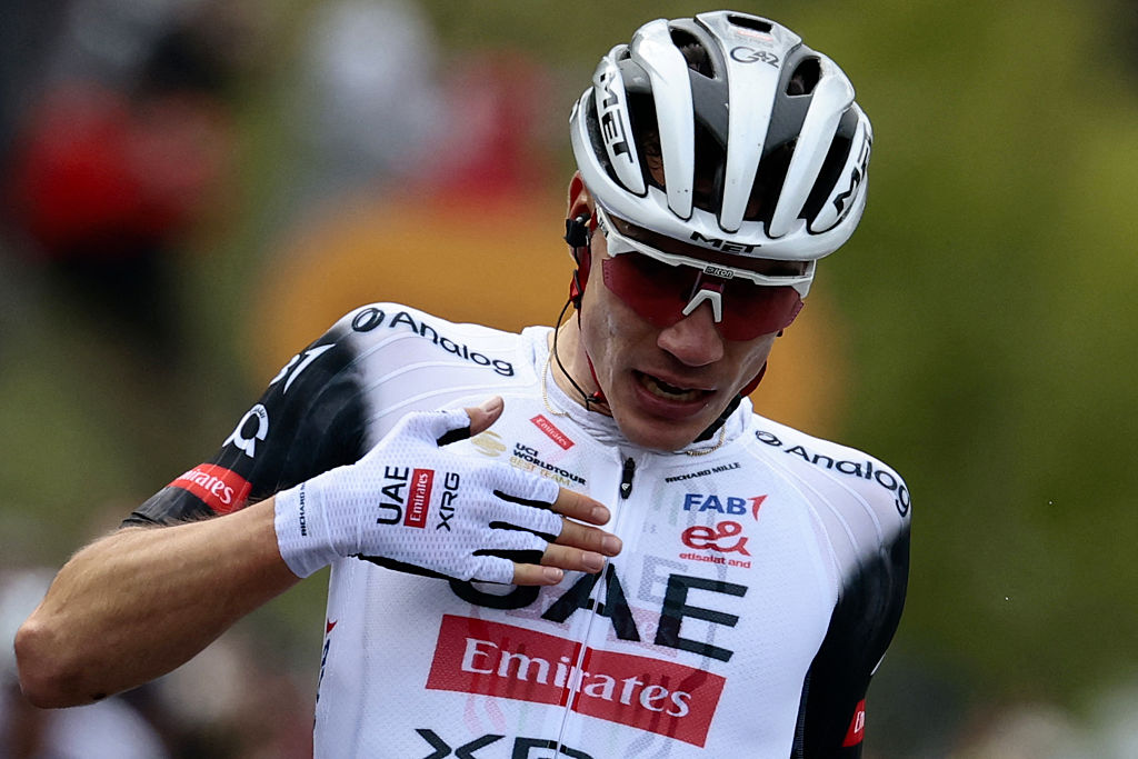 UAE Team Emirates XRG's Spanish rider Juan Ayuso celebrates after victory as he crosses the finish of the 7th stage of the 108th Giro d'Italia cycling race 168kms from Castel di Sangro to Tagliacozzo on May 16, 2025. (Photo by Luca Bettini / AFP)